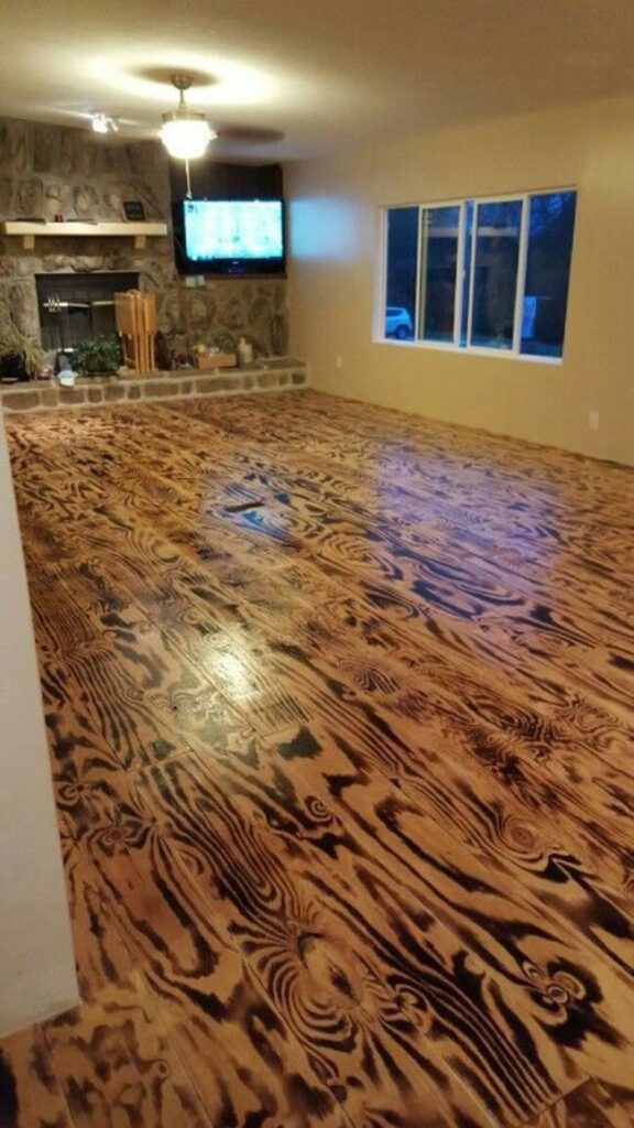 Rustic charm redefined with burnt plywood floors.