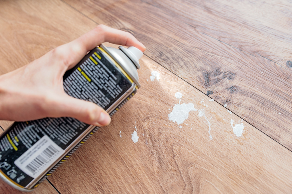 Does vinegar remove paint from wood?